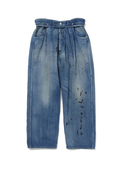 Blue jeans with distressing on a white background