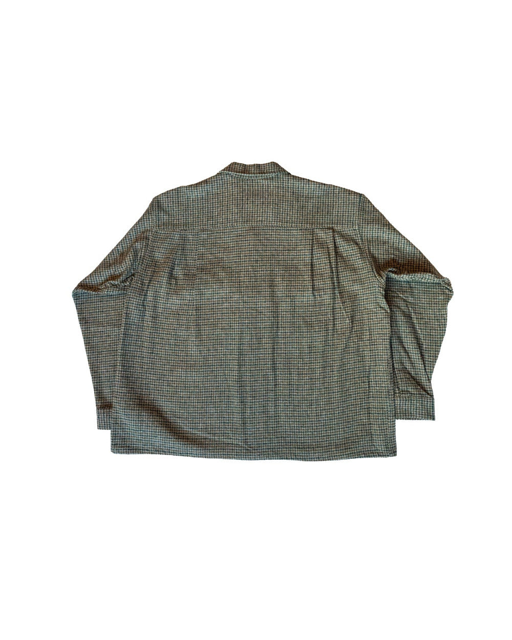 backside of a grey-greenish houndstooth shirt on a white background