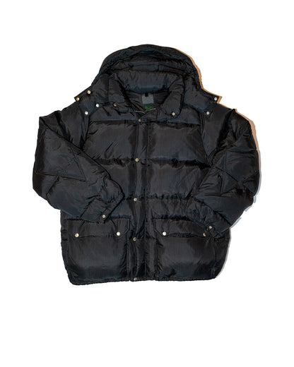 Black puffer jacket on a white background