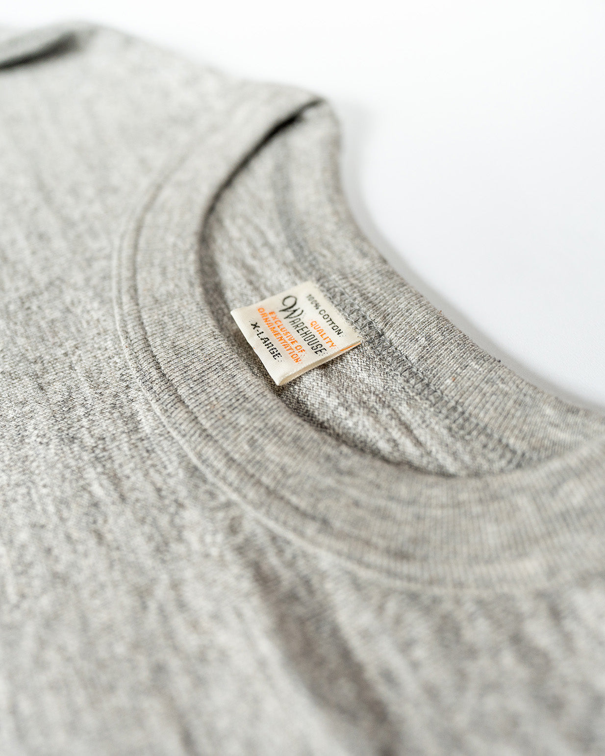 Gray garment with a warehouse & co brand label on a white background